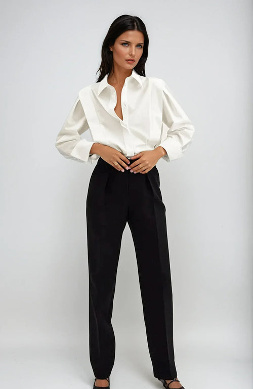 Chemise en tissu respirant femme à boutons multiples pour un style chic en toute occasion - image 1